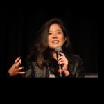 Carolina Kia Takada, CEO da weme, em palestra no Future Summit 22